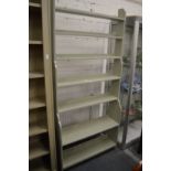 An Oka green painted free standing open bookcase.