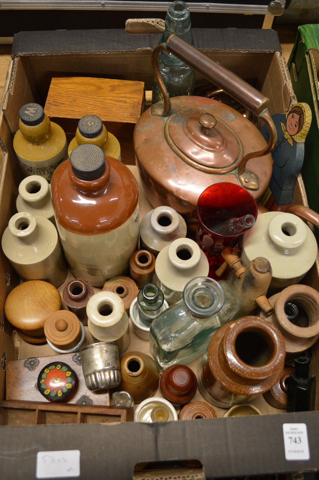 Stoneware jars, glass bottles, copper kettle and other collectables.