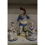 A group of porcelain figures.
