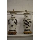 A large pair of Chinese crackle glaze porcelain lamp vases (faults).