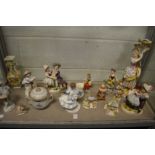 A quantity of decorative figurines and other china.