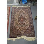 A good small Persian part silk rug, cream ground with floral decoration 4'2" x 2'7".