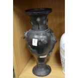 A Japanese cast metal vase.