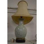 A Chinese vase lamp.