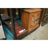 A small display cabinet and a table top cabinet.