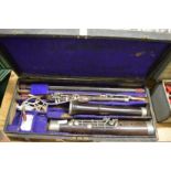 A cased bassoon stamped Riviere and Hawkes 28 Leicester Square London.