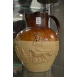 A large salt glazed hunting jug.