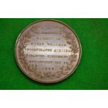 A bronze Pharmaceutical Society of Great Britain medallion dated 1852 engraved to the edge,