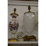 A floral decorated opaque glass table lamp and a large opaque glass table lamp.