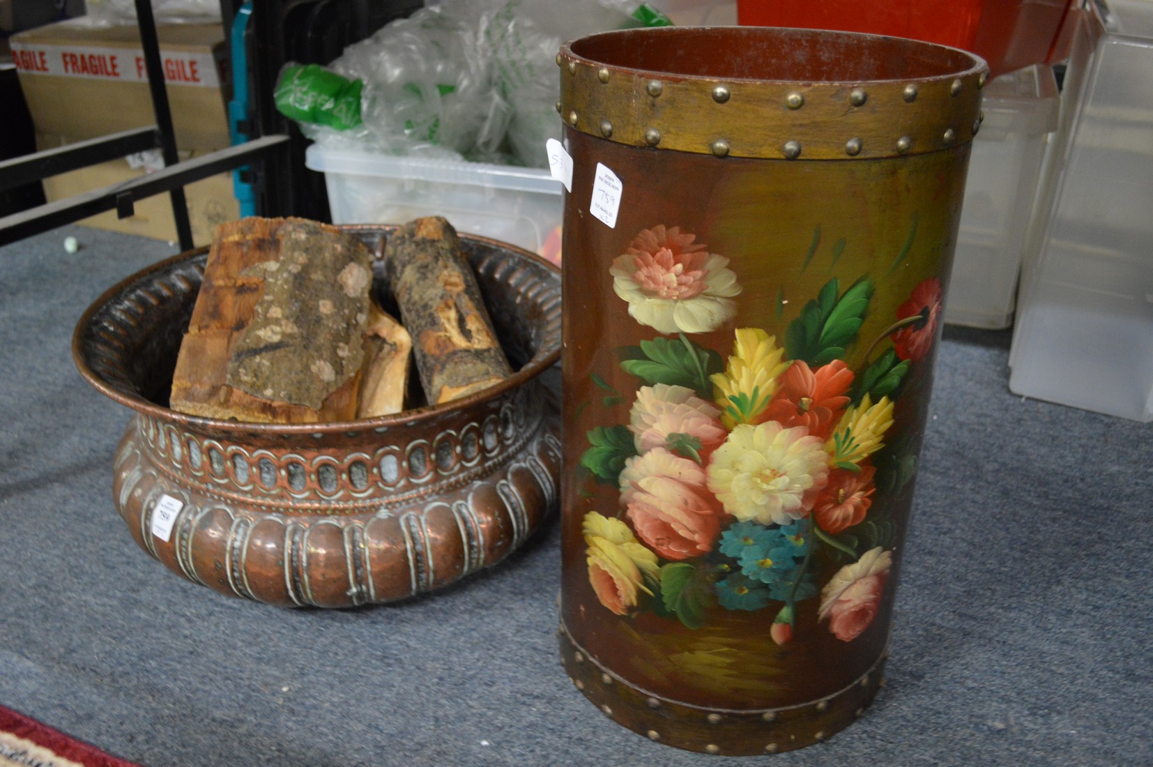 A good Eastern copper jardiniere and a decorative stick stand.