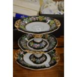 A pair of floral decorated tazza and matching dish.