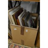 A box of paintings etc.