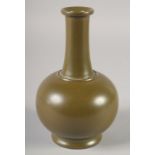 A CHINESE TEA DUST GLAZE BOTTLE VASE, with six-character Qianlong mark, 19cm high.