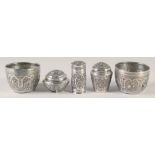 THREE EMBOSSED AND CHASED SILVER LIDDED BOXES, with floral decoration, combined weight 200g,