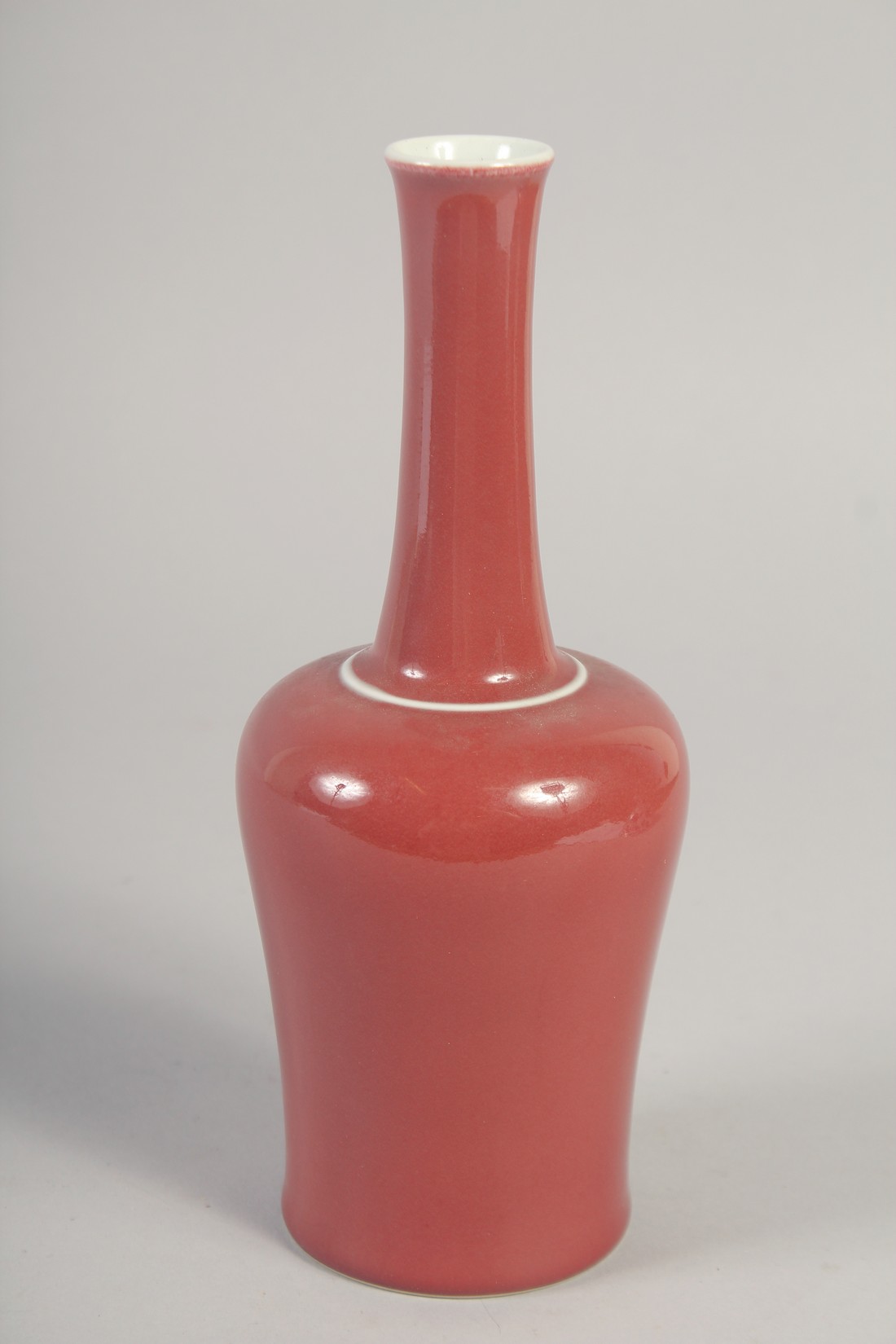 A CHINESE REPUBLIC COPPER RED GLAZE BOTTLE VASE, the base with character mark, 23cm high. - Image 2 of 6