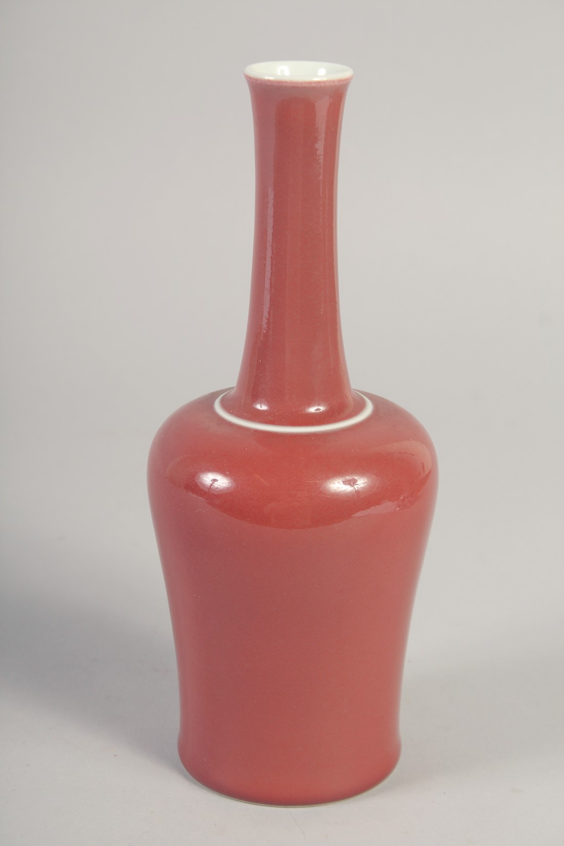 A CHINESE REPUBLIC COPPER RED GLAZE BOTTLE VASE, the base with character mark, 23cm high. - Image 3 of 6