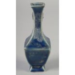 A CHINESE MINIATURE POWDER BLUE SQUARE FORM VASE, (af), 13cm high.