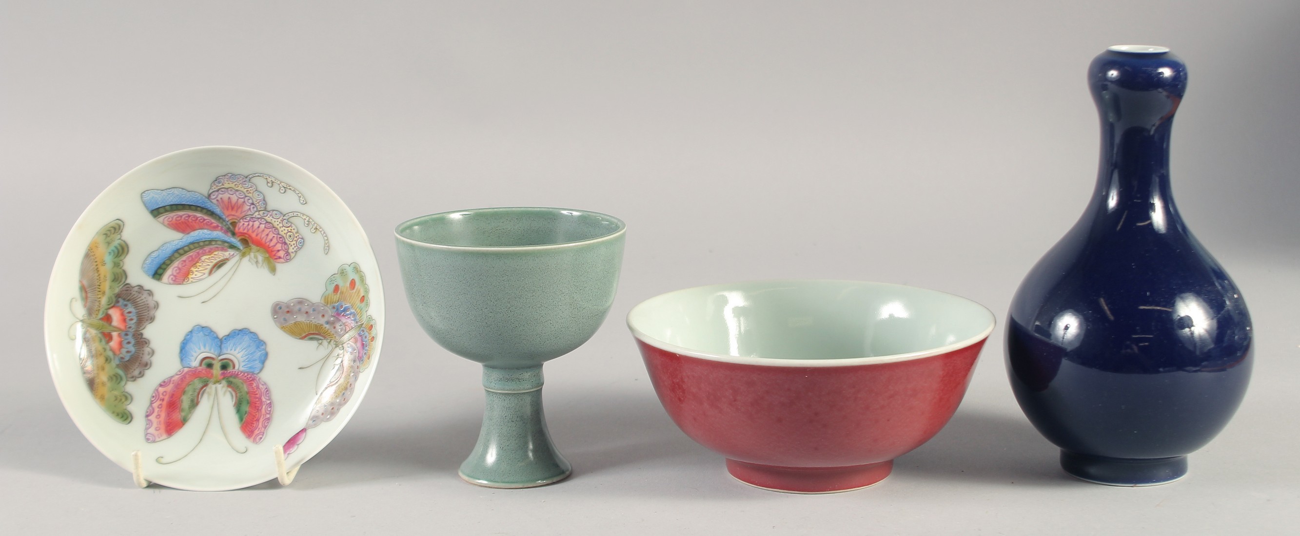 A COLLECTION OF FOUR CHINESE PORCELAIN ITEMS, comprising a vase, a cup, a bowl and a dish, (4).