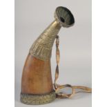 A LARGE 19TH CENTURY BOVINE HORN BRASS MOUNTED POWDER FLASK, 41.5cm long.