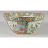 A LARGE CHINESE CANTON FAMILLE ROSE PORCELAIN PUNCH BOWL, 39cm diameter.