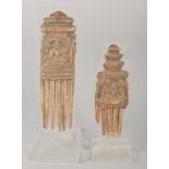 TWO 16TH-17TH CENTURY SOUTH INDIAN CARVED BONE COMBS, 13cm and 10.5cm, (2).