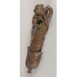 A BRONZE OKIMONO OF A MONKEY AND CORN, 9cm long.