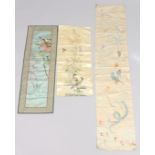 A COLLECTION OF THREE EARLY 20TH CENTURY CHINESE TABLE RUNNERS, depicting dragons, birds and