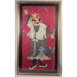 A LARGE EARLY 20TH CENTURY SILK PANEL OF A CHINESE WARRIOR, framed and glazed, textile 156cm x