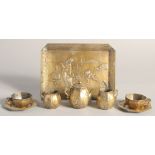 AN EARLY 20TH CENTURY JAPANESE GILDED & SILVERED SOFT METAL MINIATURE PART TEA SERVICE, comprising a