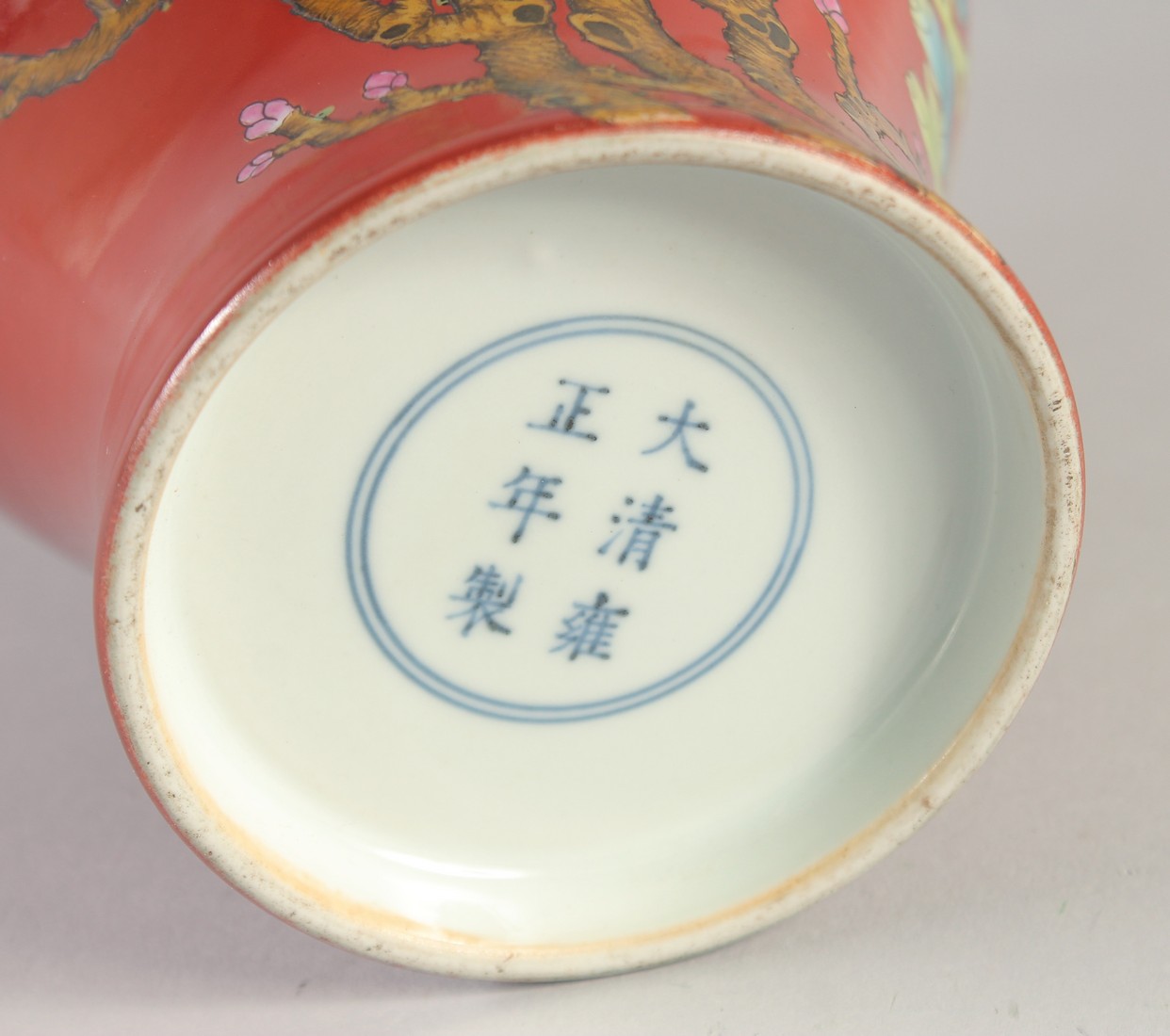 A CHINESE RED GROUND PORCELAIN TWIN HANDLE VASE, painted with flora, six-character mark to base, - Image 6 of 6