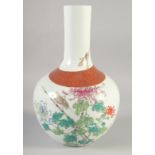 A CHINESE FAMILLE ROSE PORCELAIN VASE, painted with flora and insects with a coral red and gilt