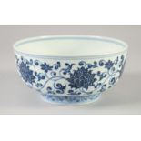 A CHINESE BLUE AND WHITE PORCELAIN BOWL, the exterior decorated with lotus and vine, six-character