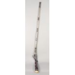 AN EARLY 19TH CENTURY AFGHAN MATCHLOCK RIFLE, with bone stock and metal mounts, 153.5cm long.