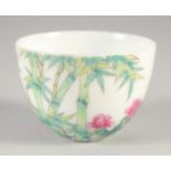 A CHINESE FAMILLE ROSE PORCELAIN CUP, four-character mark to base, 6cm diameter.