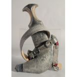 AN EARLY 20TH CENTURY ARAB AMANI HORN HILTED JAMBIYA, with silver mounted and velvet overlaid wooden