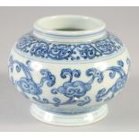A CHINESE BLUE AND WHITE PORCELAIN POT, six-character mark to base, 9cm high.
