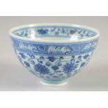 A SMALL CHINESE BLUE AND WHITE PORCELAIN BOWL, with lotus and vine motif, interior centre with