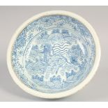 A CHINESE BLUE AND WHITE PORCELAIN BOWL, possibly late Qing Dynasty, the interior painted with a