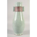 A LARGE CHINESE CELADON CRACKLE GLAZE VASE, with twin handles, 40cm high.