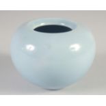 A CHINESE PALE BLUE PORCELAIN BRUSH WASHER, 6.5cm high.