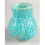 A FINE 12TH-13TH CENTURY PERSIAN KASHAN TURQUOISE GLAZED POTTERY VASE, 14.5cm high.