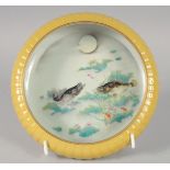 A CHINESE FAMILLE VERTE PORCELAIN BRUSH WASHER, with yellow glaze exterior, the interior decorated