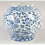 A FINE CHINESE BLUE AND WHITE PORCELAIN JAR, painted with flora and birds, four-character mark to