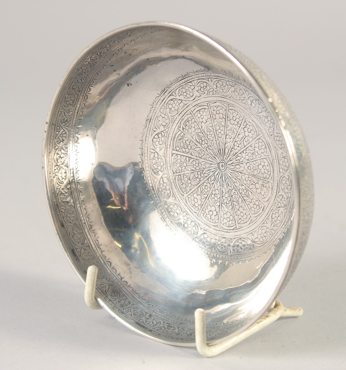 A PERSIAN FINELY ENGRAVED SILVER BOWL, with a band of figures and foliate motifs, weight 80g, 11cm - Image 2 of 3