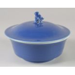 A CHINESE POWDER BLUE GLAZE BOWL AND COVER, the cover with molded bird finial, bearing Yongxheng