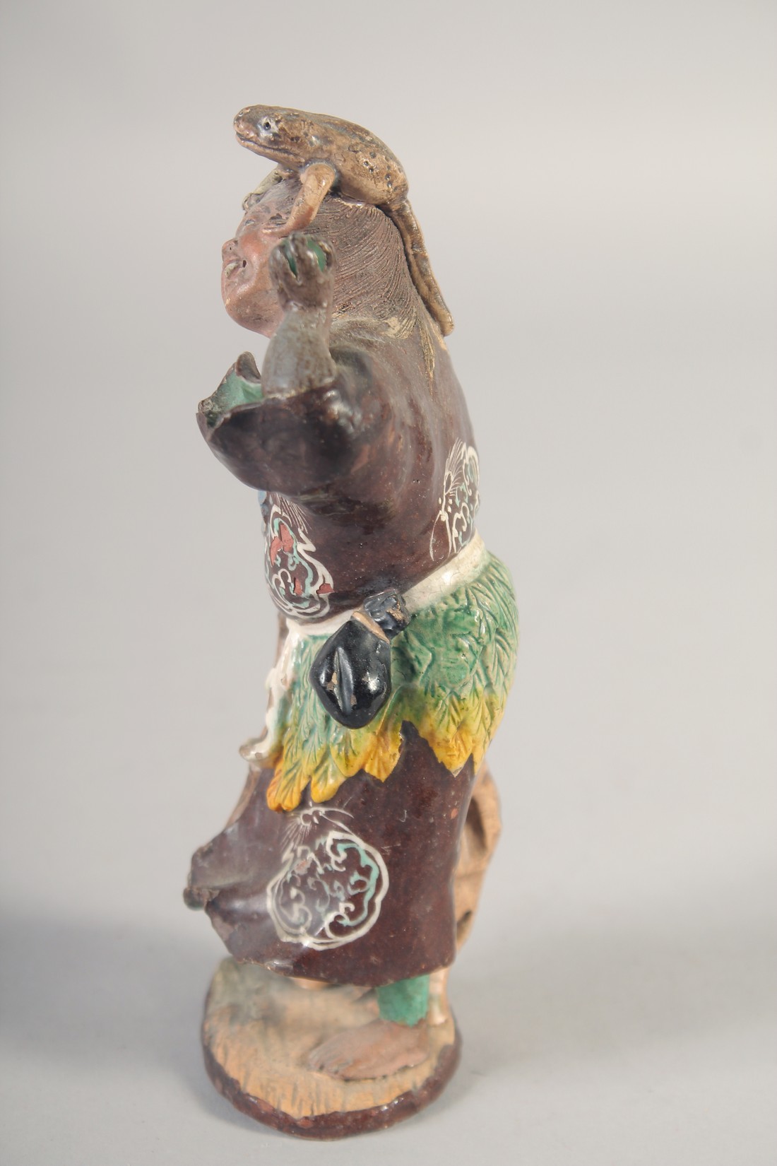 A PAINTED TERRACOTTA FIGURE OF A SENNIN and his three-legged toad, 16.5cm high. - Image 4 of 7