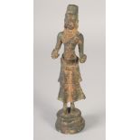 A RARE EARLY SOUTH EAST ASIAN STANDING BRONZE BUDDHA, 26.5cm high.