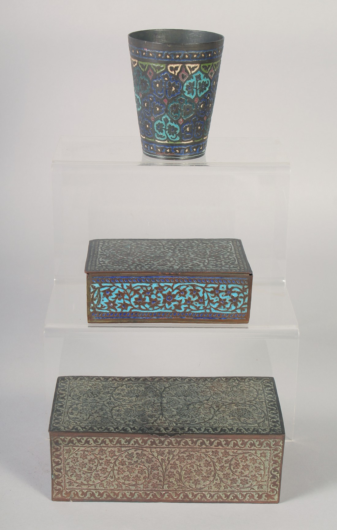 TWO INDIAN KASHMIRI BOXES AND ANOTHER ENAMELLED CUP, boxes 17cm x 8.5cm and 13cm x 8cm, cup 10cm