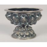 A SMALL 19TH CENTURY MALAY SILVER FOOTED BOWL, 7.5cm diameter.