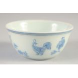A CHINESE BLUE AND WHITE CHICKEN CUP, 8.5cm diameter.